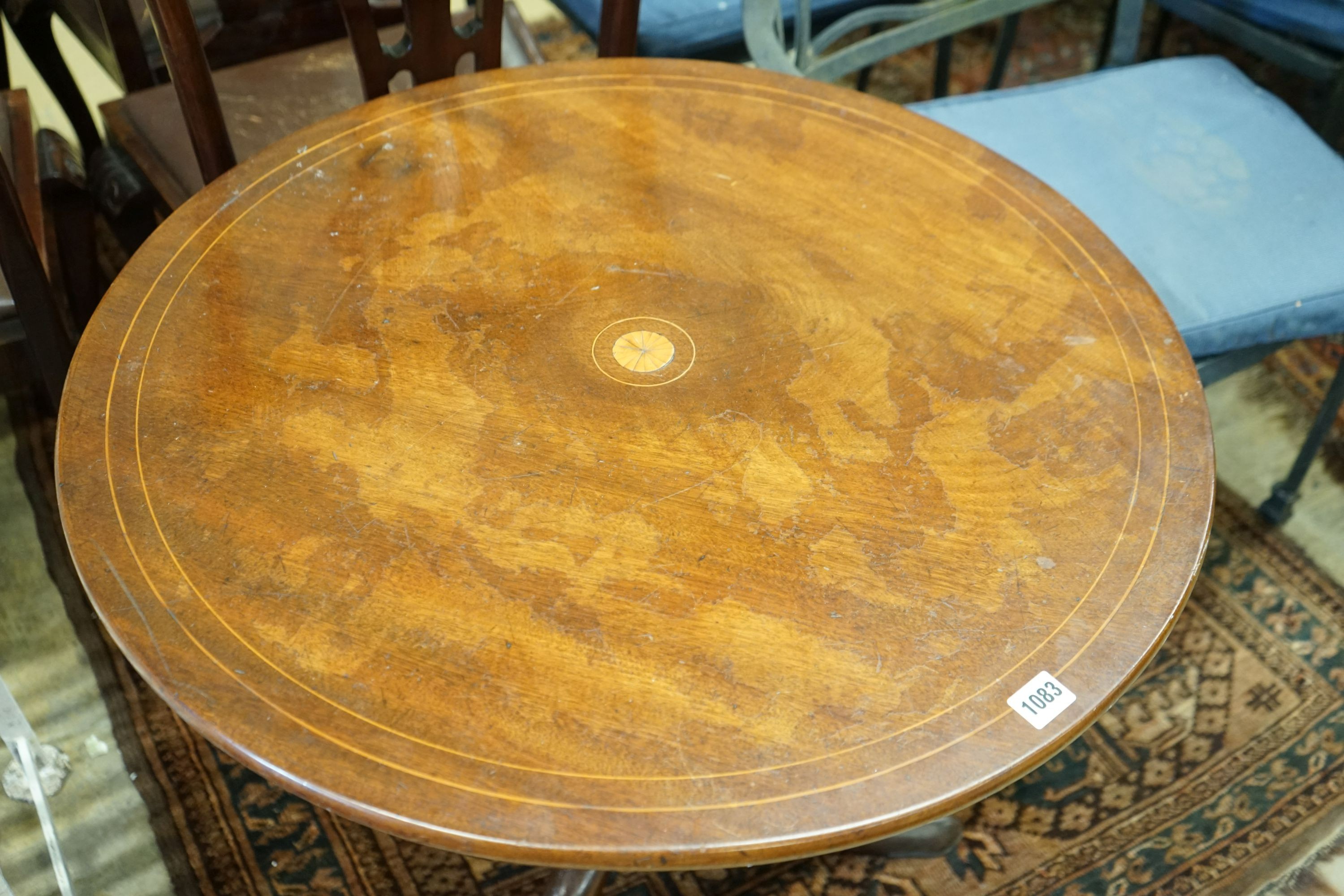 A George III inlaid mahogany circular tilt top tea table, diameter 72cm, height 69cm